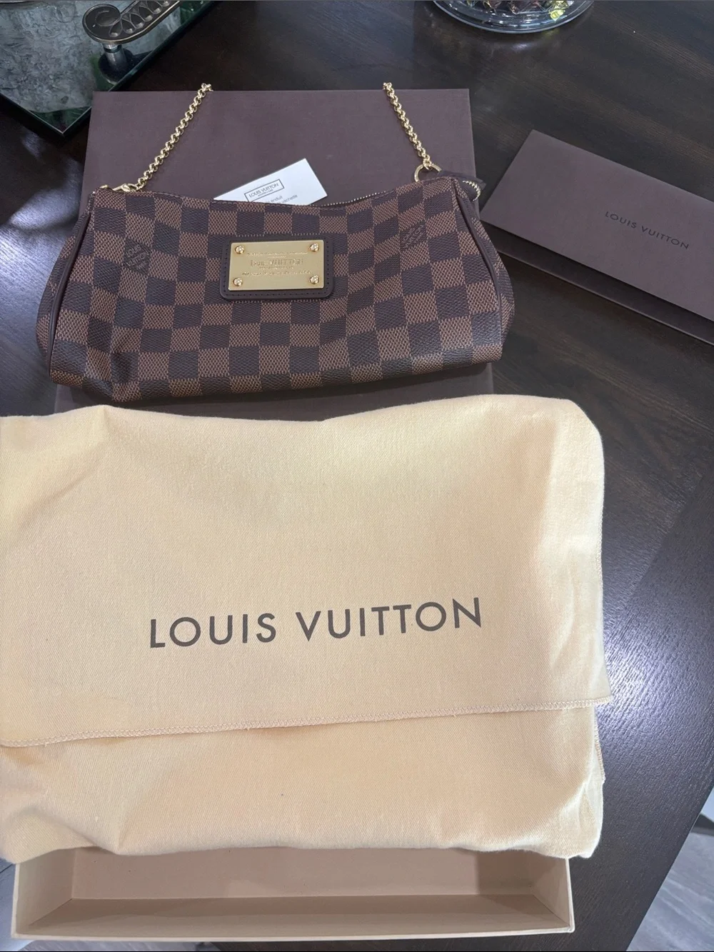 Louis Vuitton Eva Brown Damier Ebene Chain Wristlet Clutch with Gold Plaque
